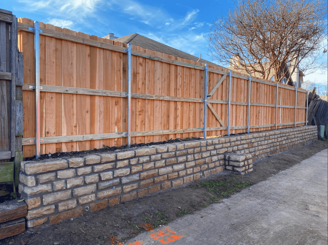 retaining-wall-garland2 Replaced failing cross tie retaining wall and fence with Milsap stone retaining wall
